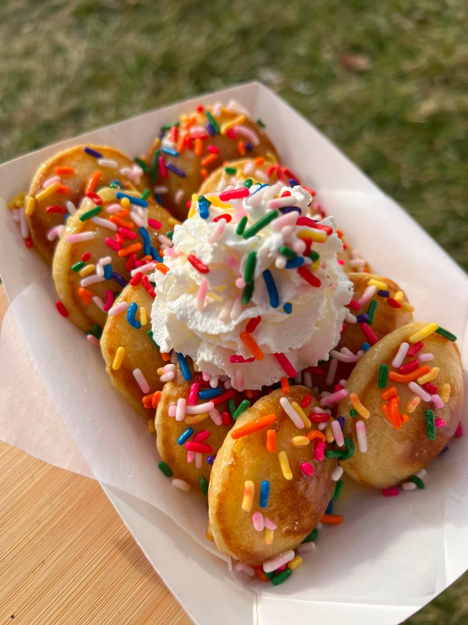 Birthday Cake mini pancakes with whipped cream and sprinkles
