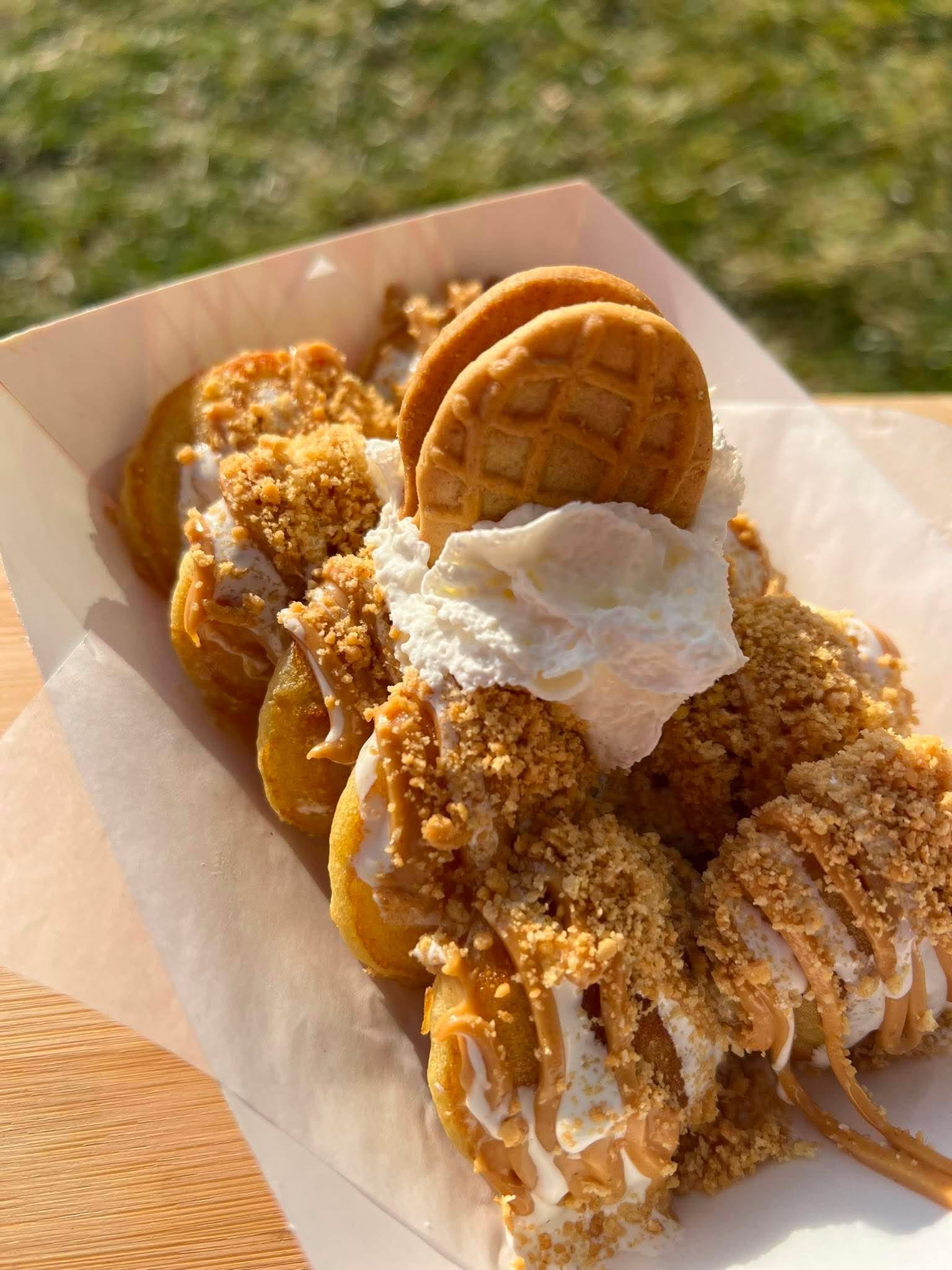 Churro Caramel Cheesecake mini pancakes with drizzle, close up