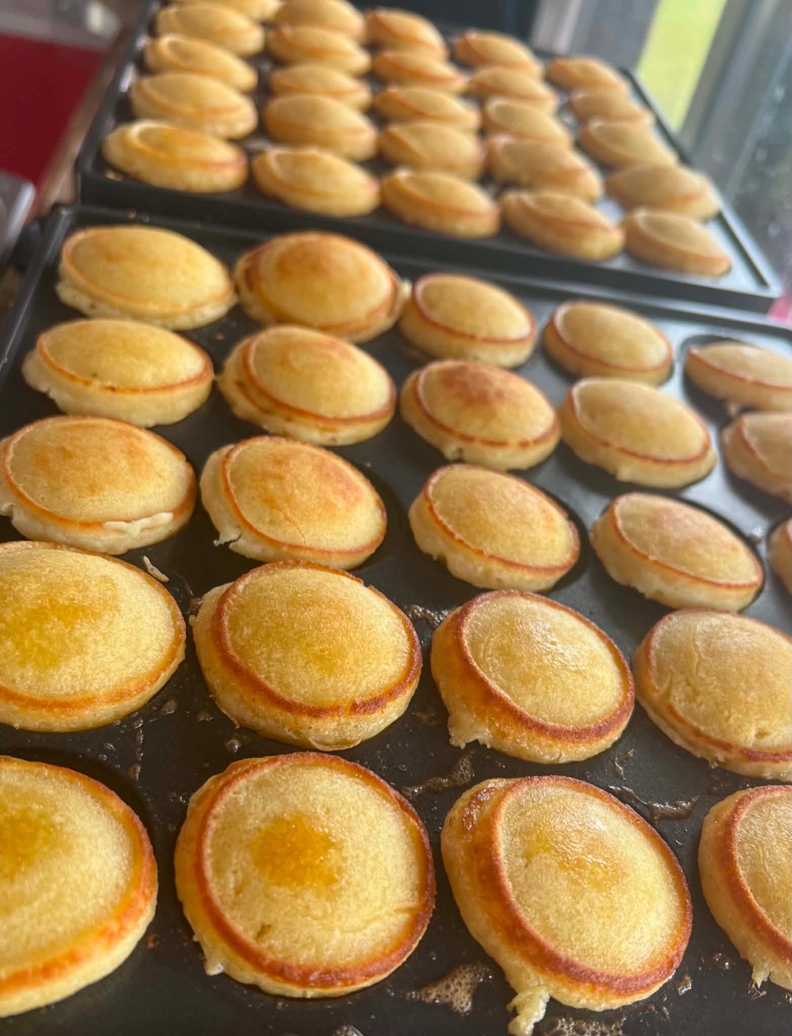 Mini pancakes fresh off the griddle